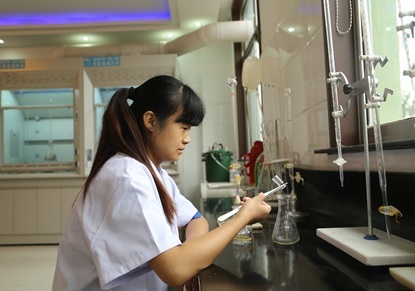 Laboratory testing personnel are busy